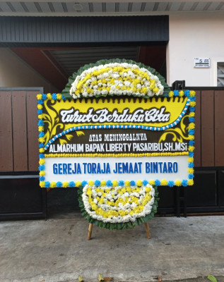 Papan Bunga Duka di Mayong